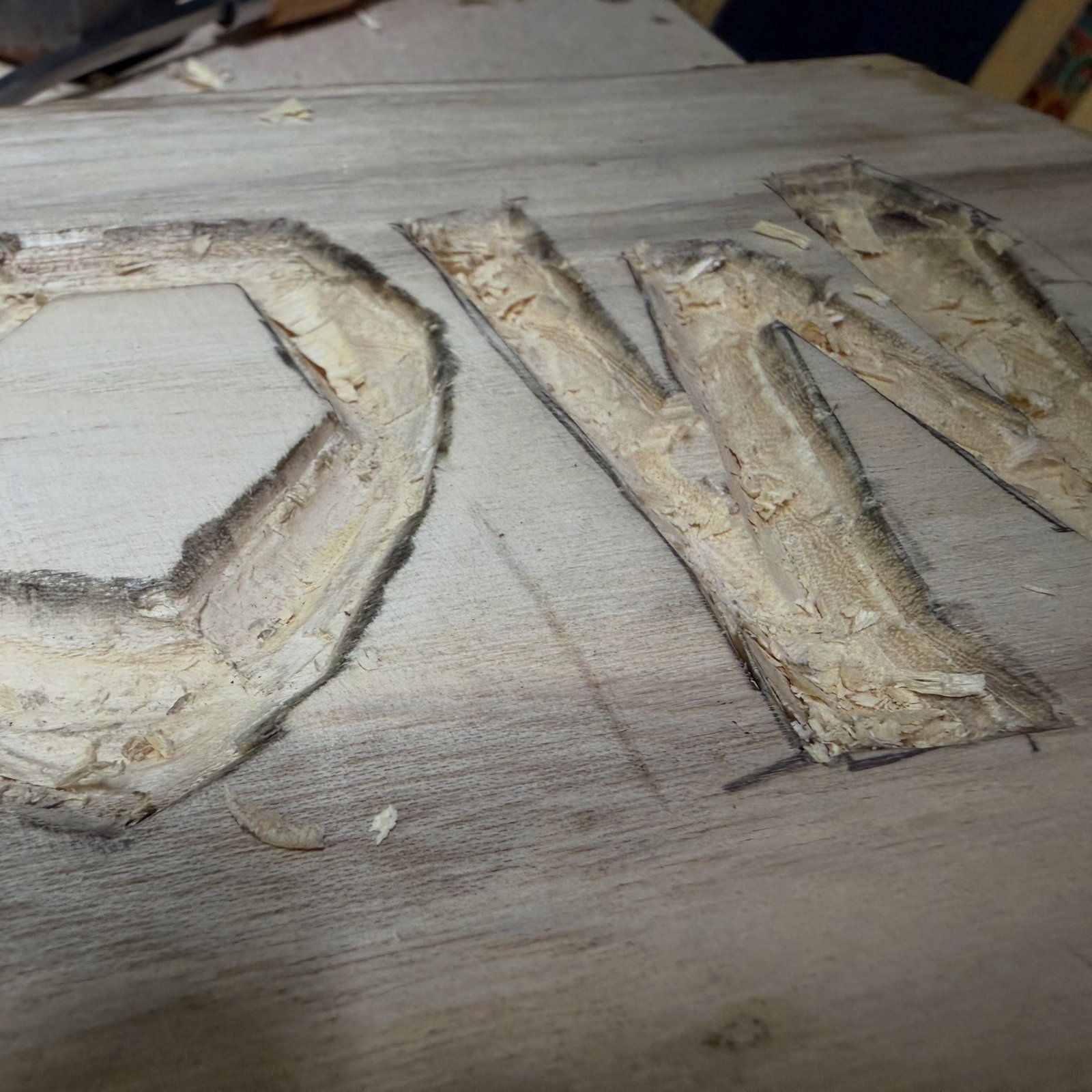 Trying my hand at wood carving a sign!